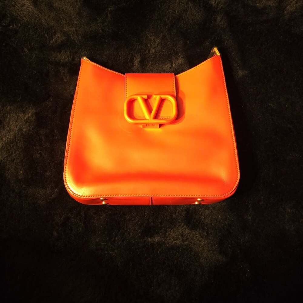Valentino Garavani VSLING Crossbody Bag in Orange Leather